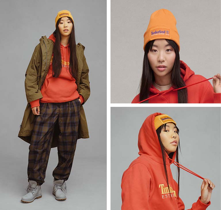Image collage showing a woman with long dark straight hair in an orange beanie and dark orange Timberland hoodie, both with logos, and a closeup of a woman from waist down wearing plaid pants and a pair of gray Timberland classic boots. 