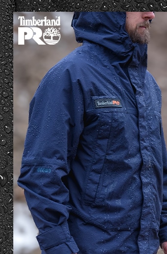 image of a man wearing a blue Timberland PRO water resistant jacket