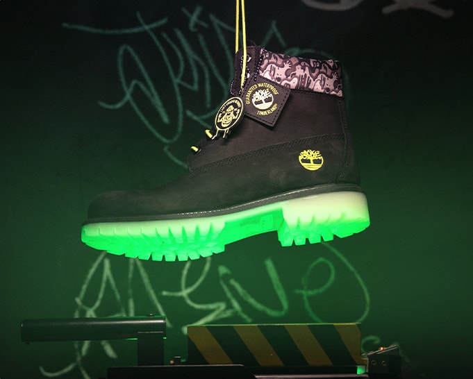The Slimer Boot is built to take on the ghosts and streets of New York, featuring slime green glow-in-the-dark laces and outsole, a modern take of the iconic Ghostbusters patch on the tongue, and a slime green ghost camo print sole.